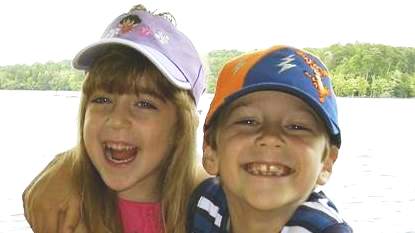 Two children happy and laughing together