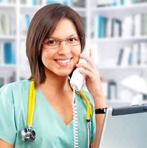 Nurse on a phone smiling